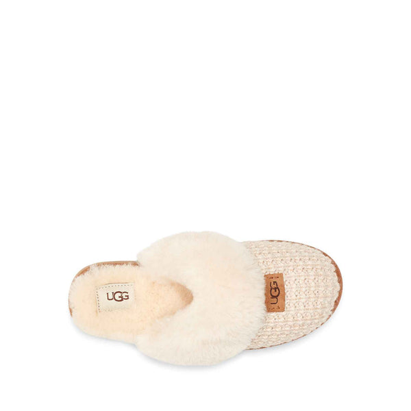 Beige UGG slipper on a white background
