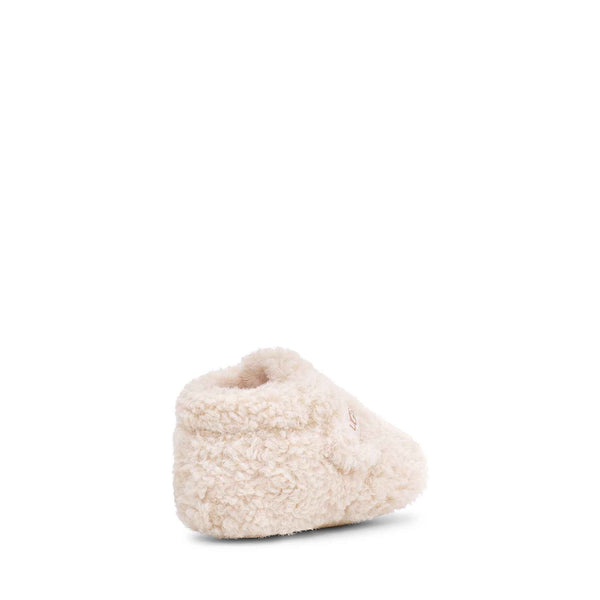 Beige slipper on a white background