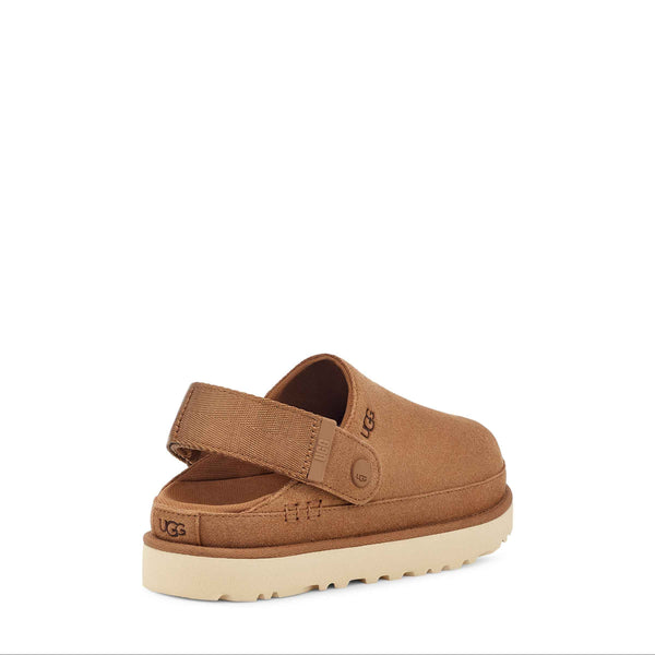 Brown sandal with a white sole on a white background
