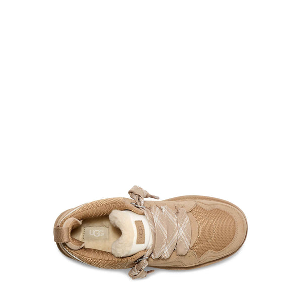 Beige sneaker on a white background