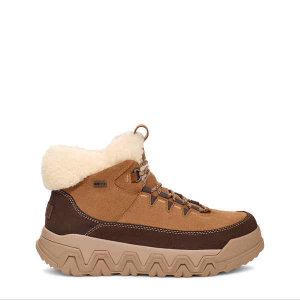 Brown winter boot with white fur lining on a white background