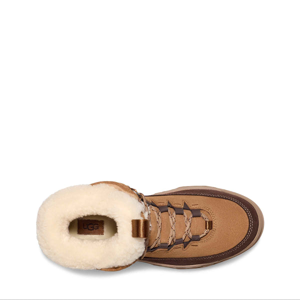 Brown leather boot with white fur lining on a white background