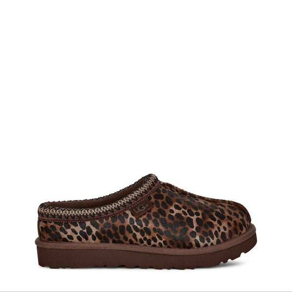 Brown slip-on shoe with leopard print pattern on a white background