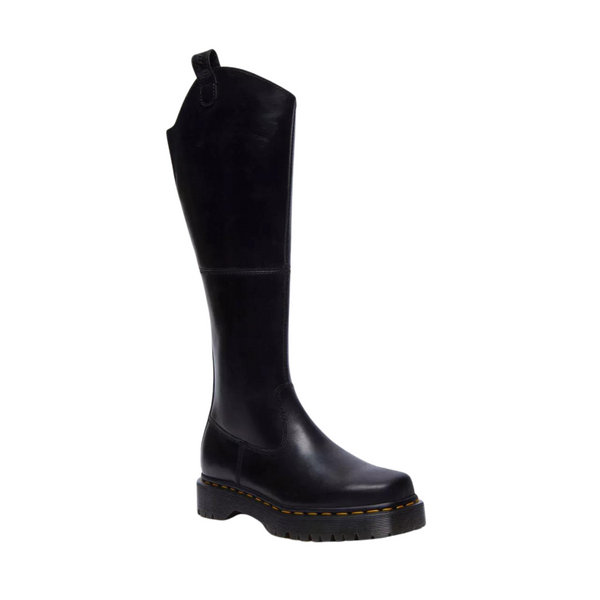 Black knee-high boot with a yellow stitched sole on a white background.