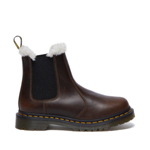 Brown leather ankle boot with elastic gusset and fluffy lining on a white background.