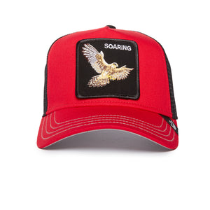 Red trucker hat with a soaring eagle patch on the front, white background.