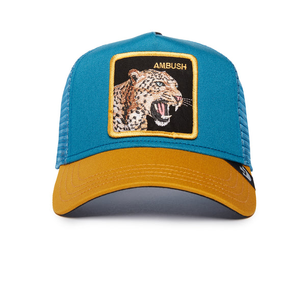 Blue and yellow baseball cap with an embroidered patch featuring a snarling leopard.