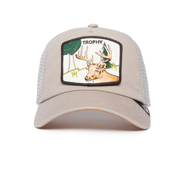 Front view of a beige trucker hat with embroidered deer and the word "trophy" patch on the front.